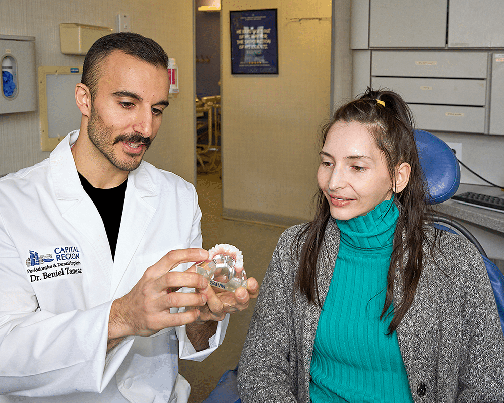 Doctor With Patient In Green